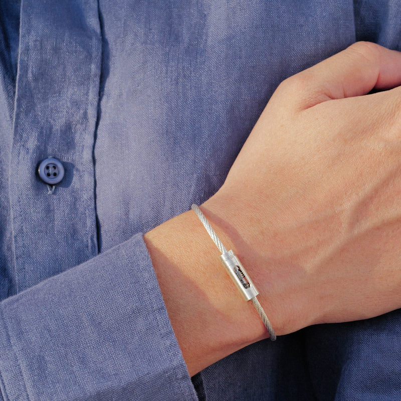 new in: the silver perforated cable bracelet